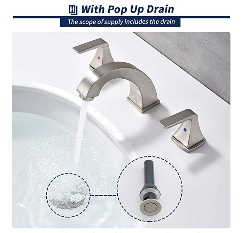 Evos Boutique chrome 3-hole bathroom faucet running water zoomed in