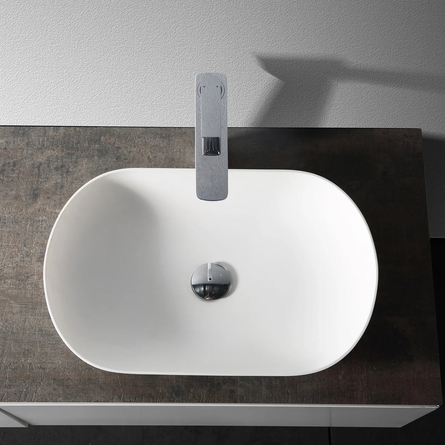 Evos Boutiques mineral cast countertop washbasin looking down